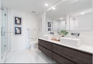 ELEGANT CONDO IN THE PRESTIGIOUS ENVY RESIDENCES. SPACIOUS OPEN