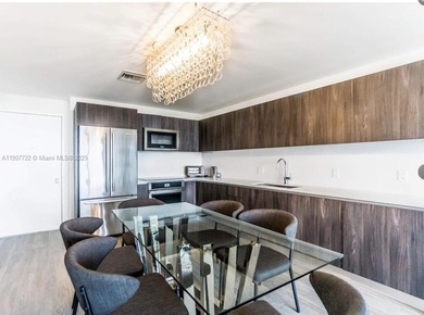 A MUST SEE! BEST LOCATION IN AVENTURA. 2 BEDROOMS PLUS DEN 2