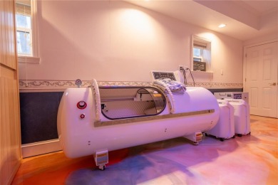 One or more photo(s) has been virtually staged. WORLD-RENOWNED