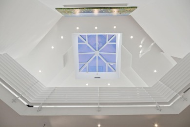 An architectural masterpiece, this Frank Lloyd Wright-inspired