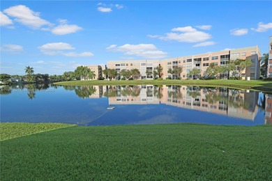 Immaculate 1st-floor unit in HOPA verified 55+ community. This