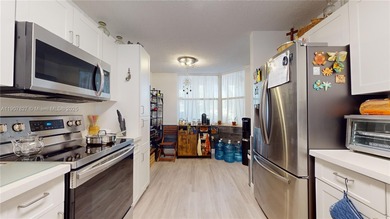 Immaculate 1st-floor unit in HOPA verified 55+ community. This