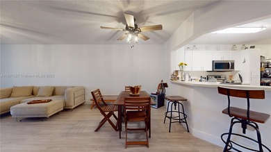 Immaculate 1st-floor unit in HOPA verified 55+ community. This