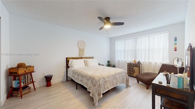 Immaculate 1st-floor unit in HOPA verified 55+ community. This