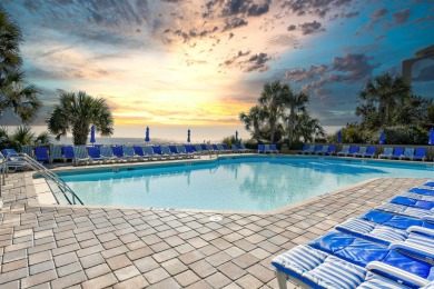 Experience coastal living at its finest in this beautifully