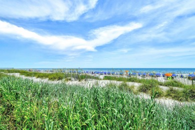 Experience coastal living at its finest in this beautifully