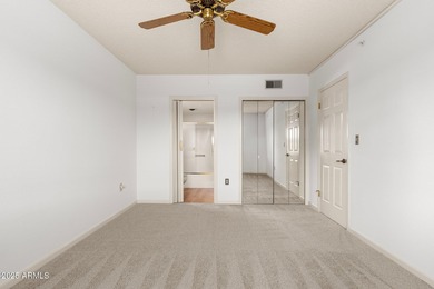 This delightful ground-floor condo offers convenience and