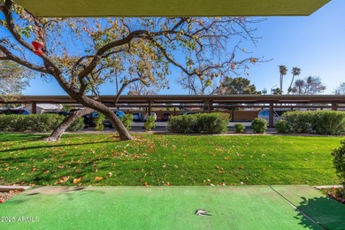 This delightful ground-floor condo offers convenience and