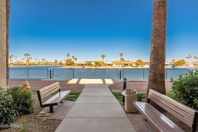 This delightful ground-floor condo offers convenience and