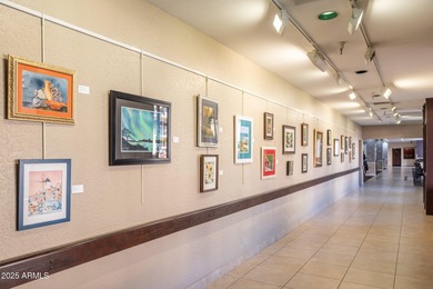 This delightful ground-floor condo offers convenience and