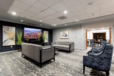 This delightful ground-floor condo offers convenience and