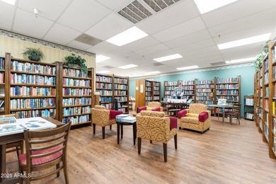 This delightful ground-floor condo offers convenience and