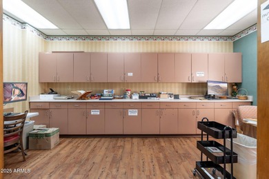 This delightful ground-floor condo offers convenience and