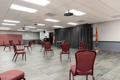 This delightful ground-floor condo offers convenience and