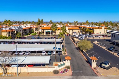 This delightful ground-floor condo offers convenience and