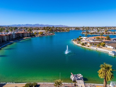 This delightful ground-floor condo offers convenience and