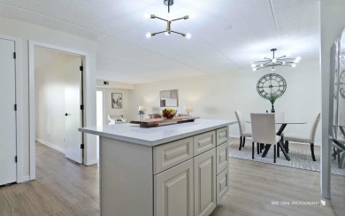 Step into this stunning fully renovated 3-bedroom, 2-bath condo