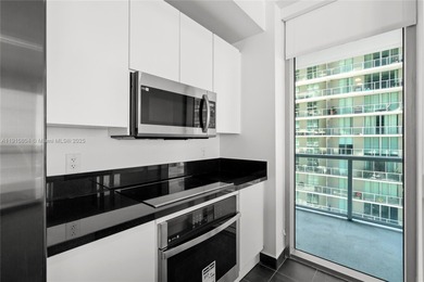Bright and spacious 2-bed, 2-bath corner unit at Axis on