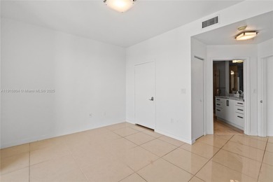 Bright and spacious 2-bed, 2-bath corner unit at Axis on