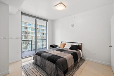 Bright and spacious 2-bed, 2-bath corner unit at Axis on