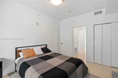 Bright and spacious 2-bed, 2-bath corner unit at Axis on