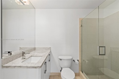 Bright and spacious 2-bed, 2-bath corner unit at Axis on