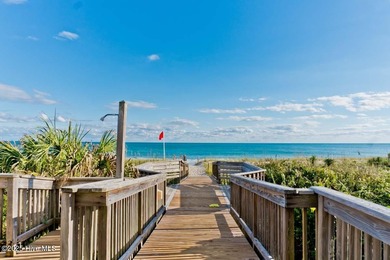 Rarely available OCEANFRONT condo in the gated Queens Court