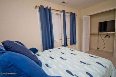 Rarely available OCEANFRONT condo in the gated Queens Court