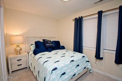 Rarely available OCEANFRONT condo in the gated Queens Court