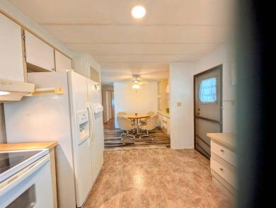 HANDICAP RAMP! Welcome to this spacious and refurbished