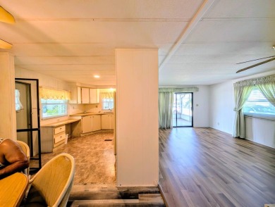 HANDICAP RAMP! Welcome to this spacious and refurbished