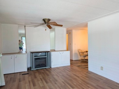 HANDICAP RAMP! Welcome to this spacious and refurbished