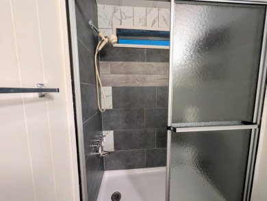 HANDICAP RAMP! Welcome to this spacious and refurbished