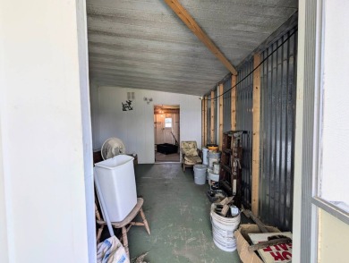 HANDICAP RAMP! Welcome to this spacious and refurbished