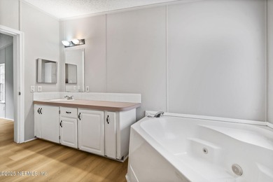 Country living in a quiet tucked away neighborhood, minutes to