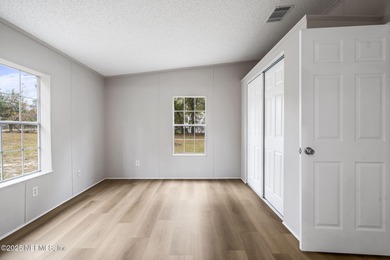 Country living in a quiet tucked away neighborhood, minutes to