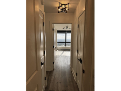 Spectacular lake and skyline views define this beautifully