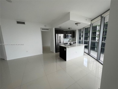 Experience elevated waterfront living in this chic 2-bed, 2