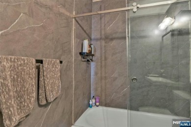 Rarely on the market-This stunning 2 bedroom 2 bath apartment