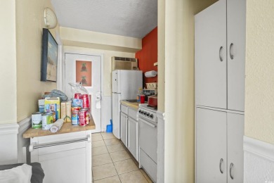 This unit is located just steps from the beach in the Wave Rider