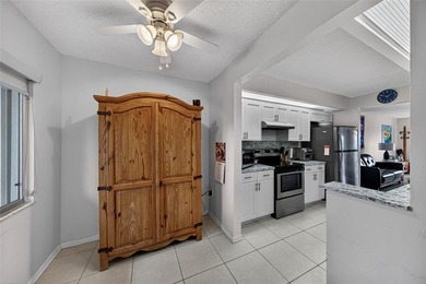 Priced to sell! Bright, updated residence in desirable Century