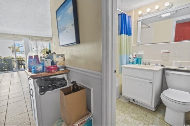 This unit is located just steps from the beach in the Wave Rider