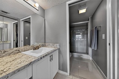 Priced to sell! Bright, updated residence in desirable Century