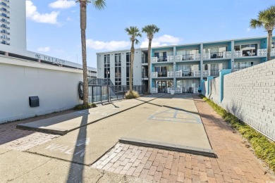 This unit is located just steps from the beach in the Wave Rider