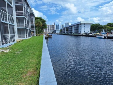 PRICE IMPROVED! Fantastic opportunity! TOP Floor 1/1.5 condo