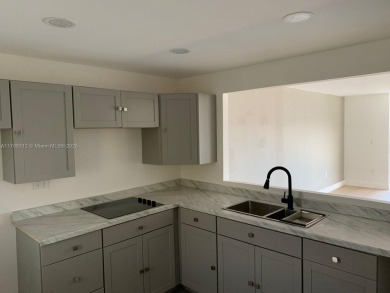 PRICE IMPROVED! Fantastic opportunity! TOP Floor 1/1.5 condo