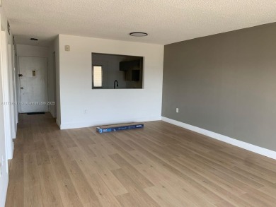 PRICE IMPROVED! Fantastic opportunity! TOP Floor 1/1.5 condo