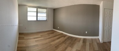 PRICE IMPROVED! Fantastic opportunity! TOP Floor 1/1.5 condo