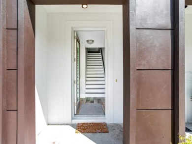 High and Dry! Elevated townhome, no living space on ground level