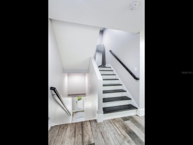 High and Dry! Elevated townhome, no living space on ground level